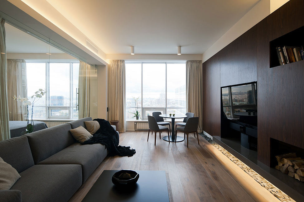 Элегантный дизайн интерьера квартиры с панорамными окнами в москве — стильный проект от алексея николашина